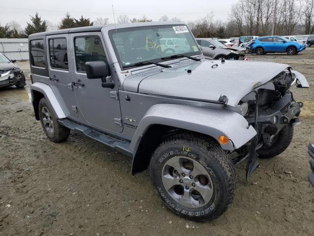 1C4BJWEG3GL125016 - 2016 JEEP WRANGLER U SAHARA SILVER photo 4