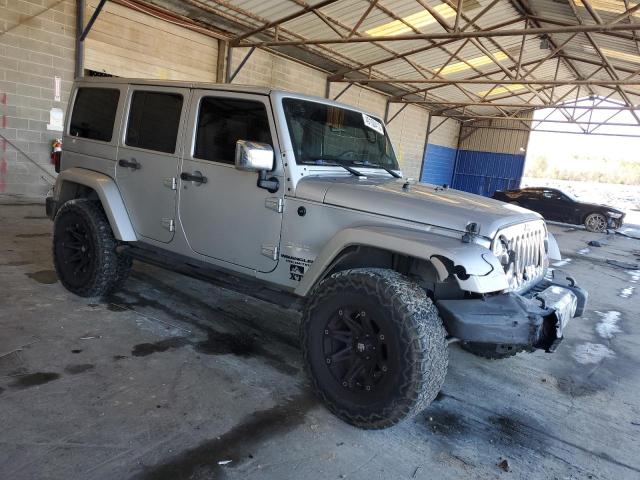 1C4HJWEG1CL104606 - 2012 JEEP WRANGLER U SAHARA SILVER photo 4