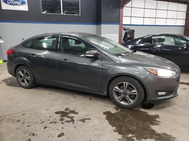 1FADP3FE0HL274042 - 2017 FORD FOCUS SE GRAY photo 4