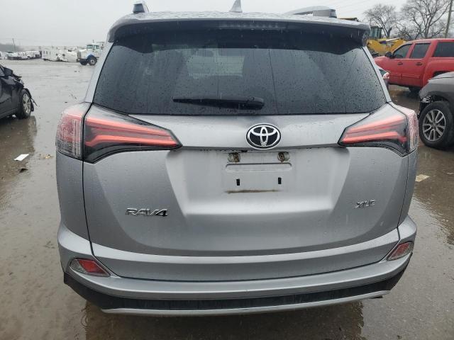 2T3WFREV7GW303218 - 2016 TOYOTA RAV4 XLE SILVER photo 6