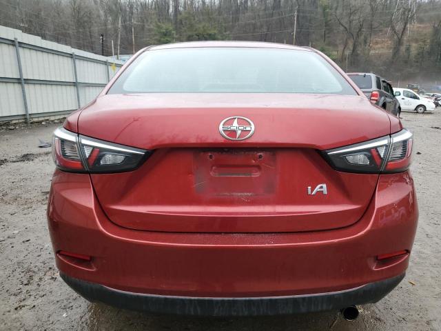 3MYDLBZV2GY100699 - 2016 TOYOTA SCION IA RED photo 6