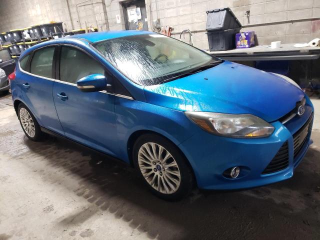 1FAHP3N26CL205843 - 2012 FORD FOCUS TITANIUM BLUE photo 4