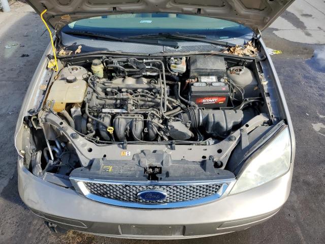 1FAFP34NX5W172155 - 2005 FORD FOCUS ZX4 TAN photo 11