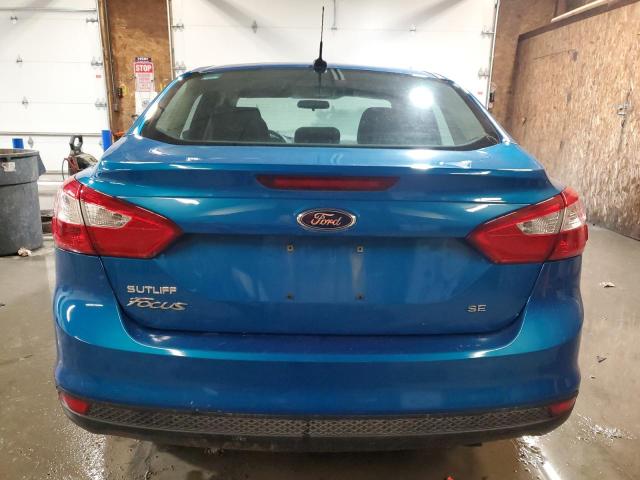 1FAHP3F27CL420582 - 2012 FORD FOCUS SE BLUE photo 6