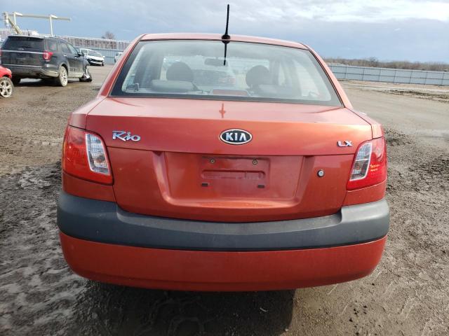 KNADE223X96524124 - 2009 KIA RIO BASE ORANGE photo 6