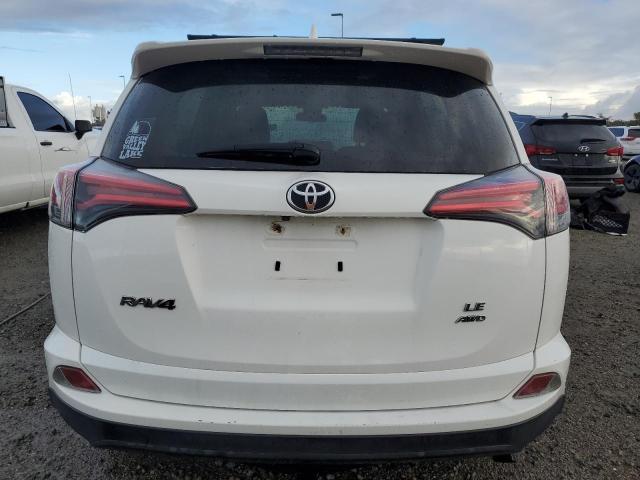 JTMBFREVXJJ177747 - 2018 TOYOTA RAV4 LE WHITE photo 6