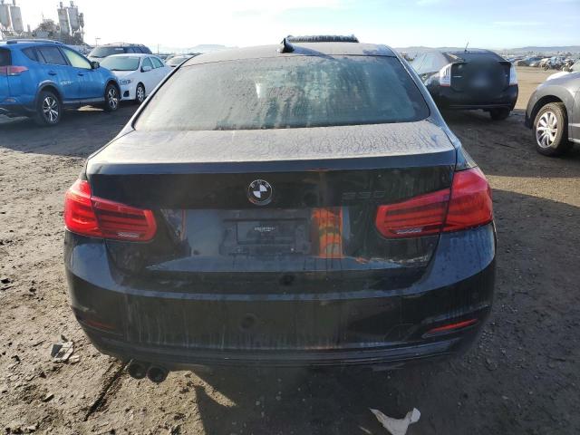 WBA8B9C57JEE82057 - 2018 BMW 330 I BLACK photo 6