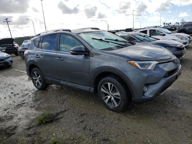 JTMWFREV6HD097162 - 2017 TOYOTA RAV4 XLE GRAY photo 4