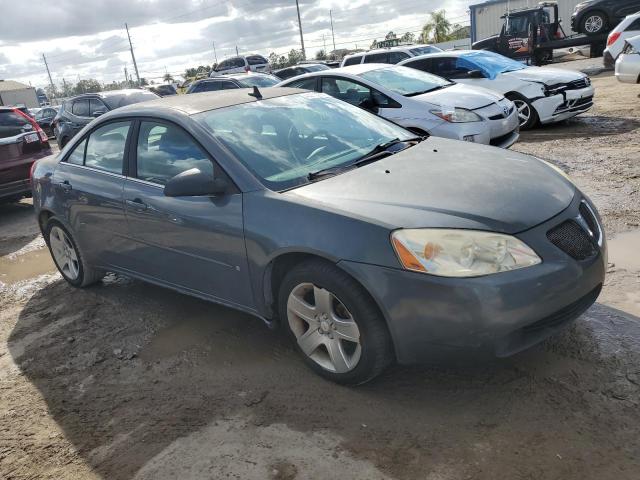 1G2ZG57BX84244660 - 2008 PONTIAC G6 BASE GRAY photo 4