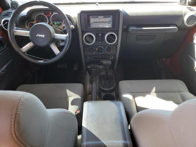 1J4GA59129L770923 - 2009 JEEP WRANGLER U SAHARA ORANGE photo 8
