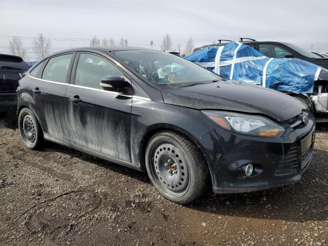 1FAHP3J27CL368345 - 2012 FORD FOCUS TITANIUM BLACK photo 4