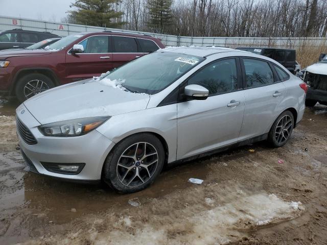 1FADP3FE8HL289534 - 2017 FORD FOCUS SE SILVER photo 1