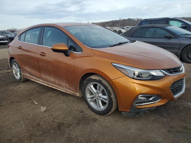 3G1BE6SM6HS564925 - 2017 CHEVROLET CRUZE LT ORANGE photo 4