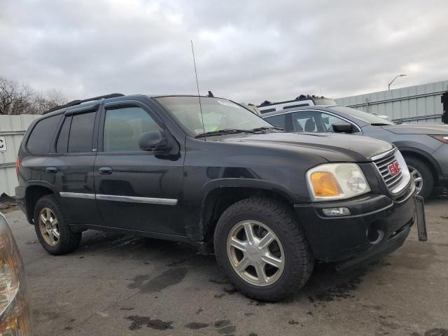 1GKDT13S572107818 - 2007 GMC ENVOY BLACK photo 4