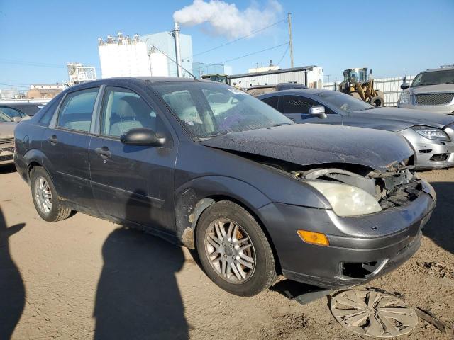 1FAFP34N37W267207 - 2007 FORD FOCUS ZX4 GRAY photo 4