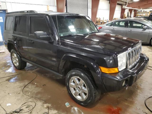 1J8HG48K97C653875 - 2007 JEEP COMMANDER BLACK photo 4