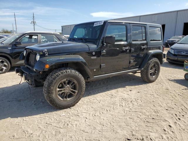 1C4BJWEG2GL326910 - 2016 JEEP WRANGLER U SAHARA BLACK photo 1
