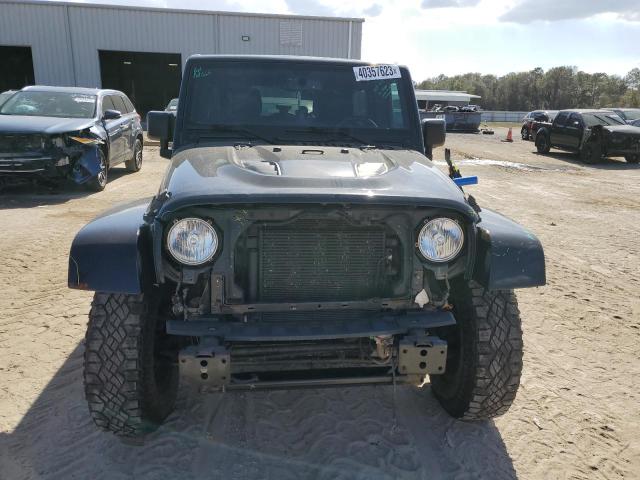 1C4BJWEG2GL326910 - 2016 JEEP WRANGLER U SAHARA BLACK photo 5