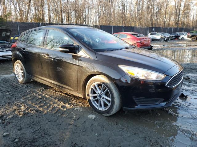 1FADP3K28HL286001 - 2017 FORD FOCUS SE BLACK photo 4