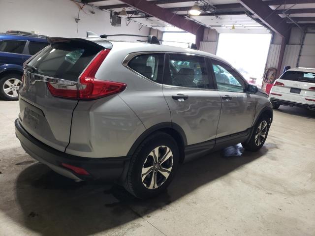 2HKRW5H36JH414339 - 2018 HONDA CR-V LX SILVER photo 3