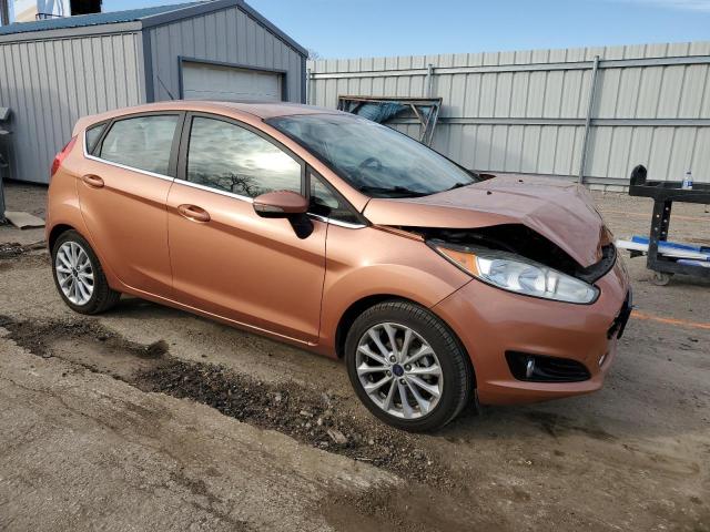 3FADP4FJ1HM139234 - 2017 FORD FIESTA TITANIUM ORANGE photo 4