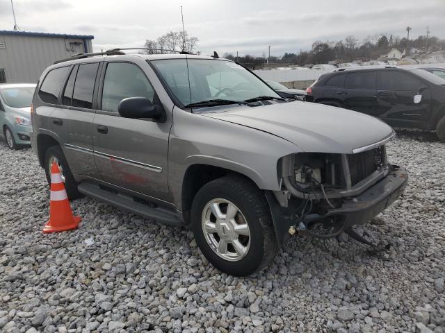 1GKDT13S372269060 - 2007 GMC ENVOY SILVER photo 4