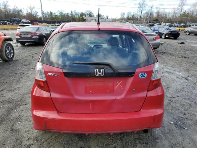 JHMGE88269S030608 - 2009 HONDA FIT RED photo 6