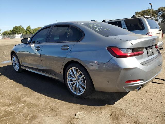 3MW69FF08P8D20772 - 2023 BMW 330I GRAY photo 2