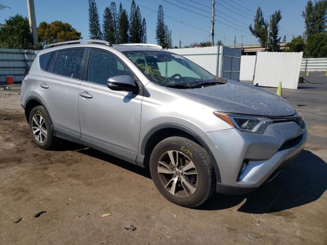 2T3WFREV3HW334080 - 2017 TOYOTA RAV4 XLE SILVER photo 4