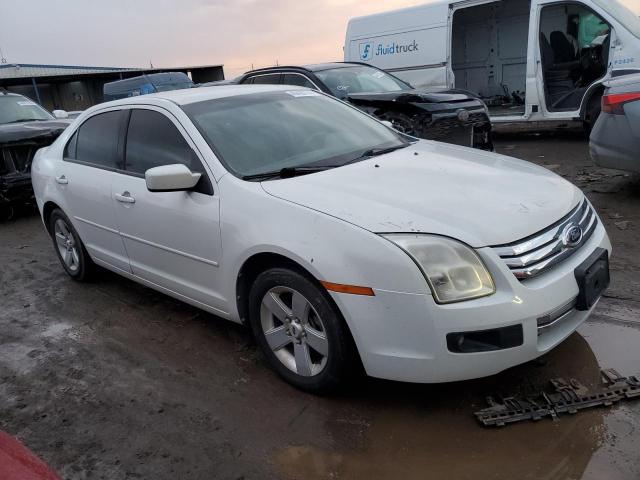 3FAHP07Z39R205107 - 2009 FORD FUSION SE WHITE photo 4