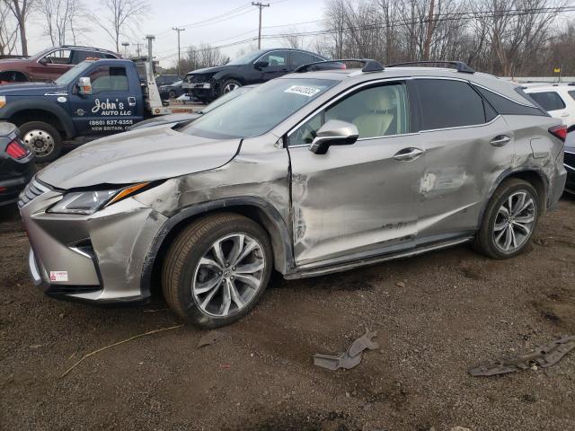 2T2BZMCA7JC148546 - 2018 LEXUS RX 350 BASE SILVER photo 1