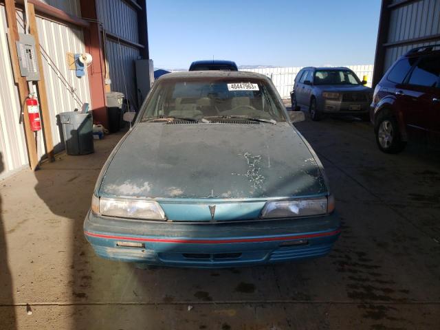 1G2JC54H7P7595007 - 1993 PONTIAC SUNBIRD LE TURQUOISE photo 5