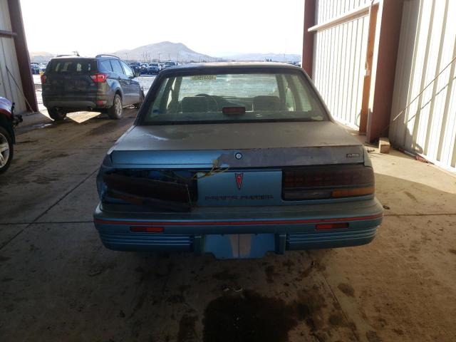 1G2JC54H7P7595007 - 1993 PONTIAC SUNBIRD LE TURQUOISE photo 6