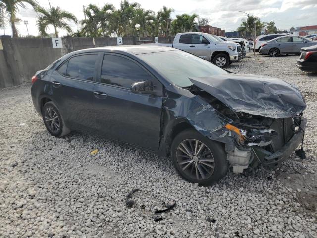 5YFBURHE8JP829990 - 2018 TOYOTA COROLLA L BLACK photo 4