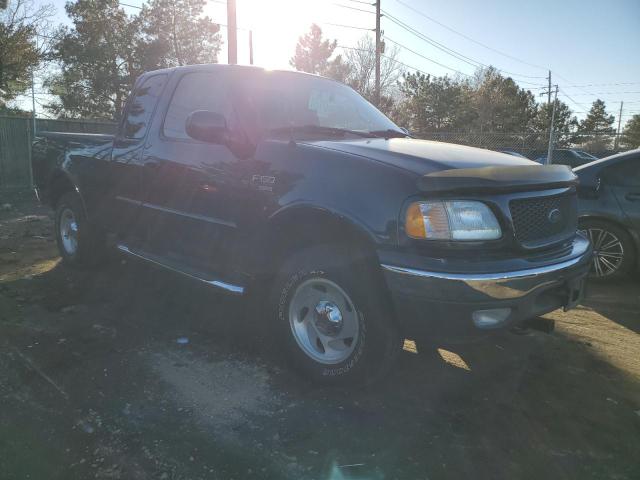 1FTRX18LXYKA90572 - 2000 FORD F150 BLUE photo 4