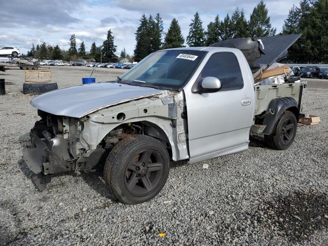 2FTZF0730YCA73055 - 2000 FORD F150 SVT LIGHTNING SILVER photo 1