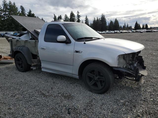 2FTZF0730YCA73055 - 2000 FORD F150 SVT LIGHTNING SILVER photo 4