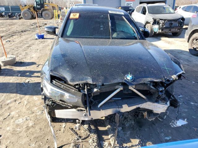 WBA5R7C50KAJ80974 - 2019 BMW 330XI Czarny zdjęcie 5