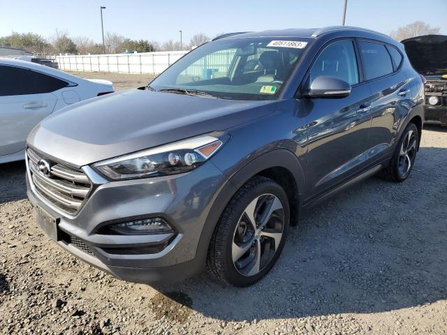 KM8J3CA23GU210958 - 2016 HYUNDAI TUCSON LIMITED GRAY photo 1