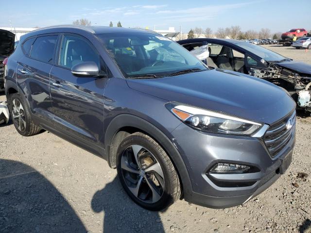 KM8J3CA23GU210958 - 2016 HYUNDAI TUCSON LIMITED GRAY photo 4