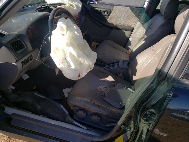 JF1SF6553WG751503 - 1998 SUBARU FORESTER S შავი ფოტო 7