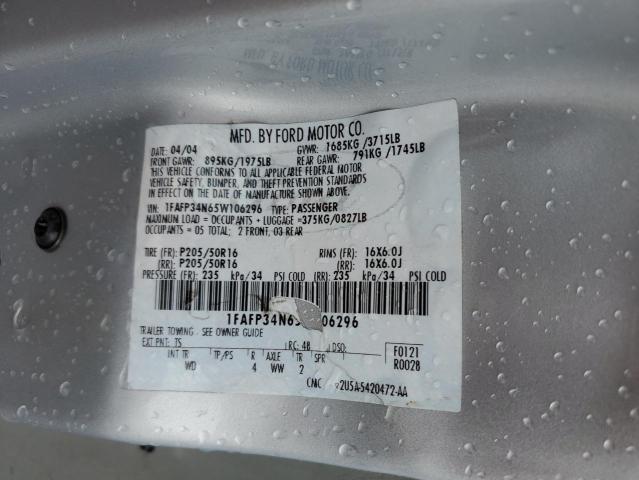 1FAFP34N65W106296 - 2005 FORD FOCUS ZX4 GRAY photo 12