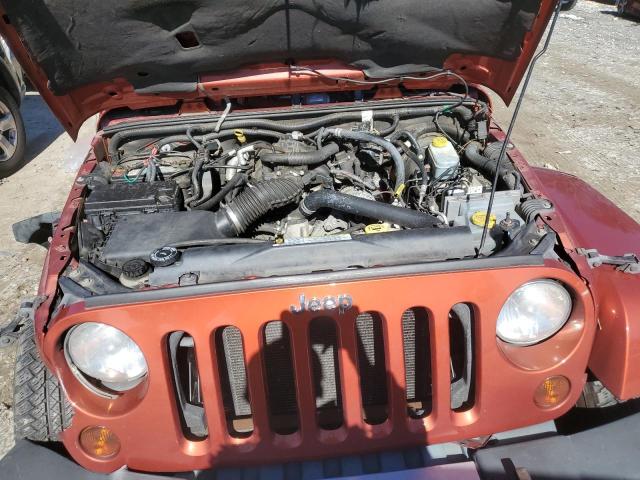1J4GA59109L783816 - 2009 JEEP WRANGLER U SAHARA ORANGE photo 12