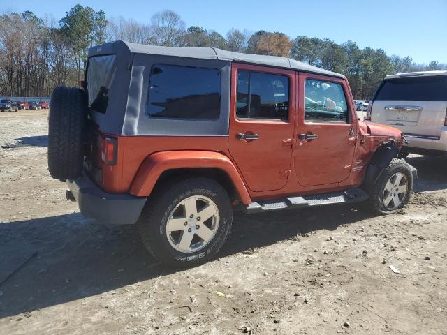 1J4GA59109L783816 - 2009 JEEP WRANGLER U SAHARA ORANGE photo 3