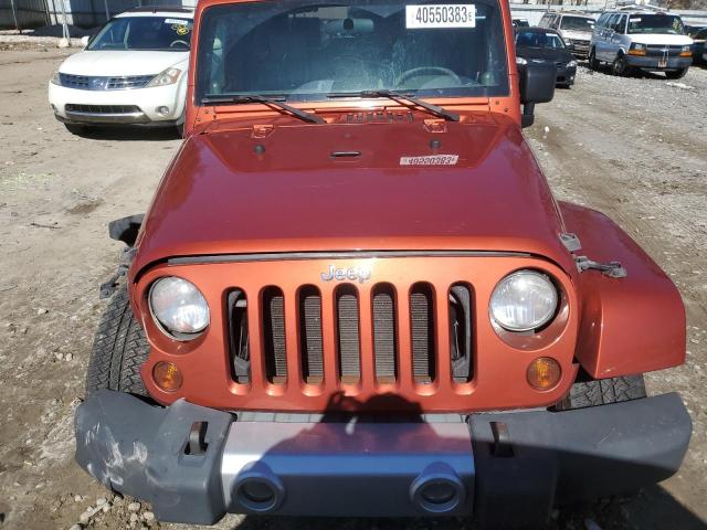 1J4GA59109L783816 - 2009 JEEP WRANGLER U SAHARA ORANGE photo 5