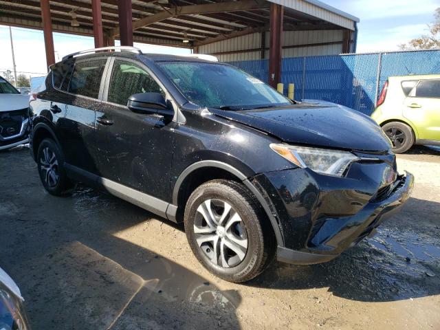 2T3ZFREV9HW352886 - 2017 TOYOTA RAV4 LE BLACK photo 4