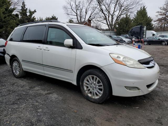 5TDBK22C69S027154 - 2009 TOYOTA SIENNA XLE WHITE photo 4