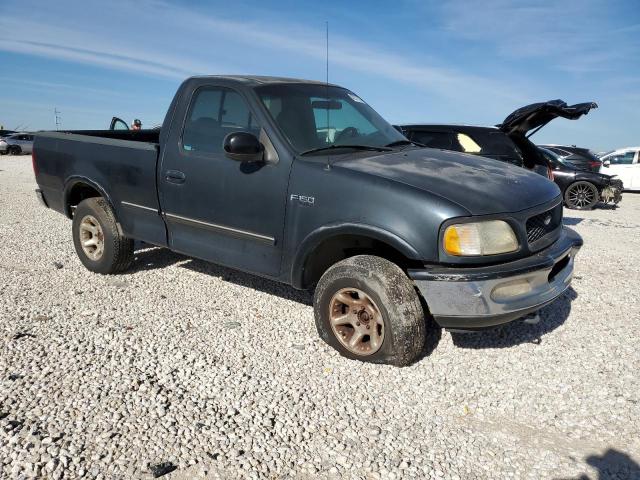 1FTDF18WXVLB48872 - 1997 FORD F150 BLACK photo 4