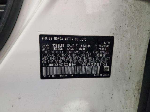 JHMGK5H57GX045104 - 2016 HONDA FIT LX WHITE photo 12