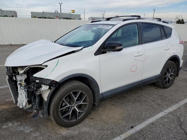 2T3JFREVXGW477598 - 2016 TOYOTA RAV4 SE WHITE photo 1